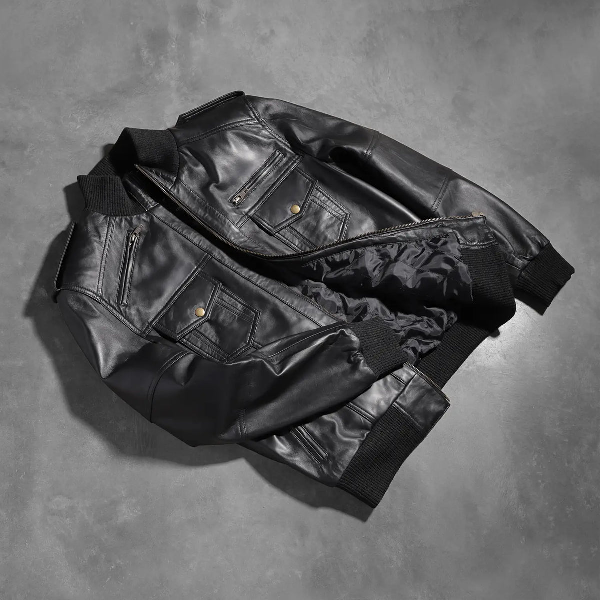 
Rib knit & Hem Craftsmanship Construction Detail on Men's Agent Shadow Black Leather Bomber Jacket