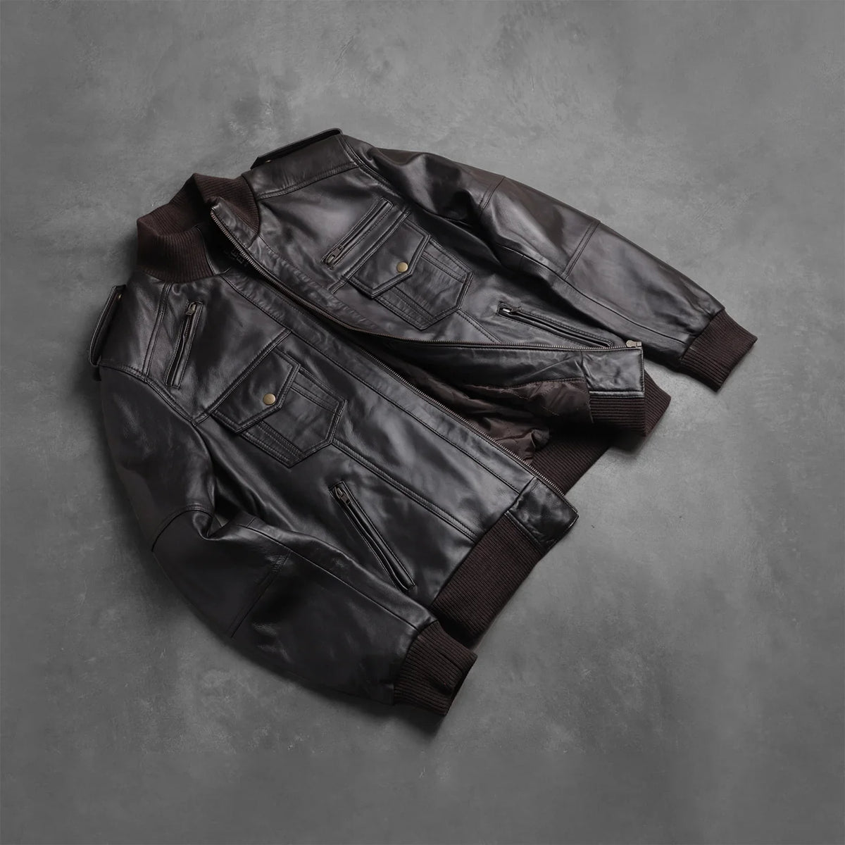 
Rib knit & Hem Craftsmanship Construction Detail on Men's Agent Shadow Brown Leather Bomber Jacket