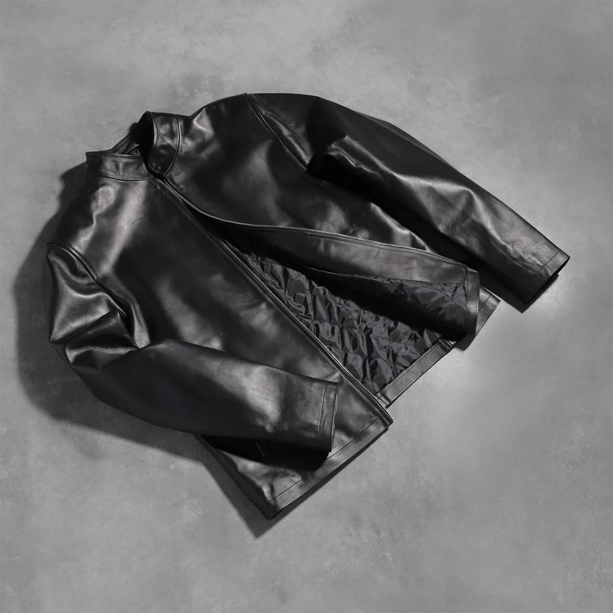 
Styled Fit Perspective of Men's Alex Black Leather Biker Jacket on Model - Natural Daylight Drape