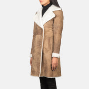 
Close-Up Detail of Notch & Leather Buttons Hardware on Women's Amie Distressed Brown Double Breasted Shearling Coat