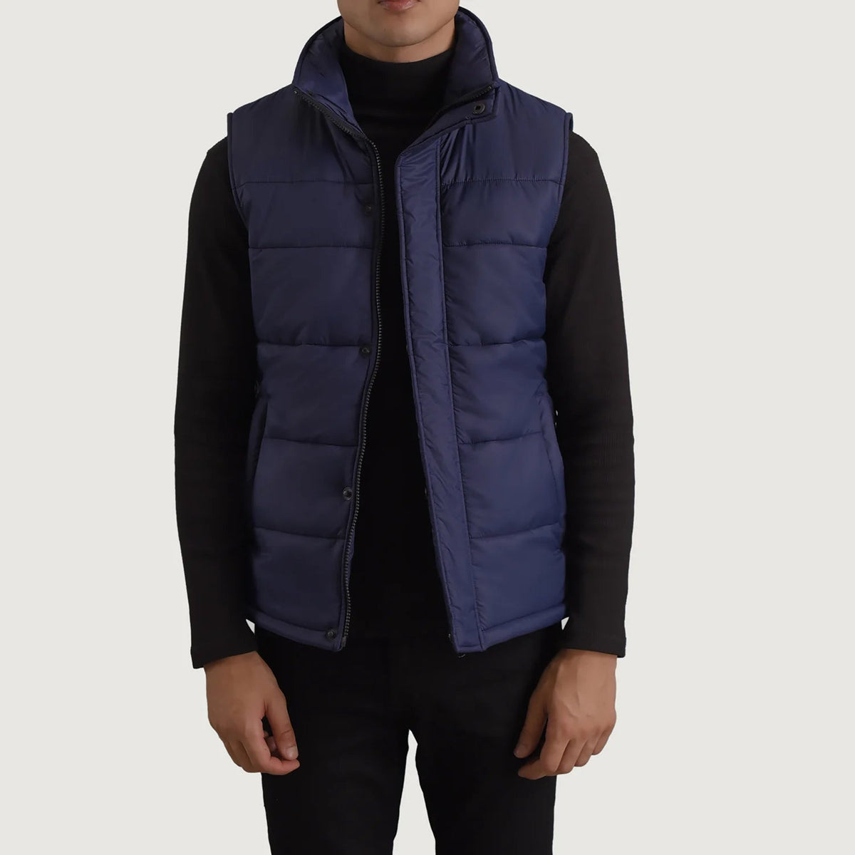 
Bryan Blue Puffer Vest in Blue Full-Grain Leather - Front Profile View & Tailored Silhouette | Buy Online