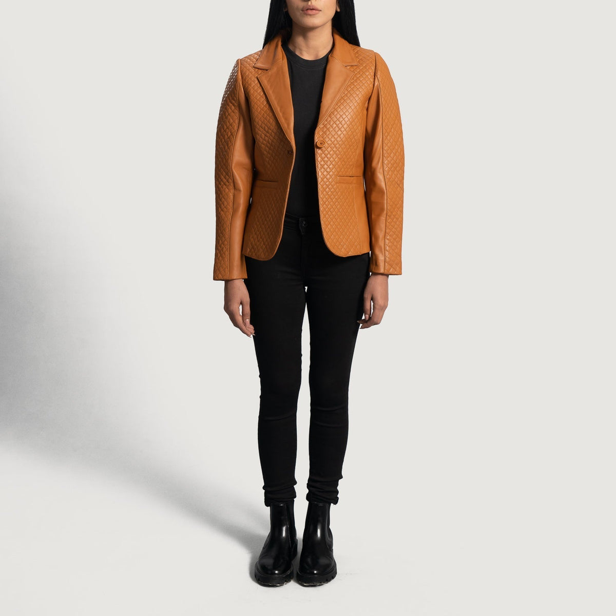 
Close-Up Detail of Notch & Button Hardware on Women's Cora Quilted Brown Leather Blazer