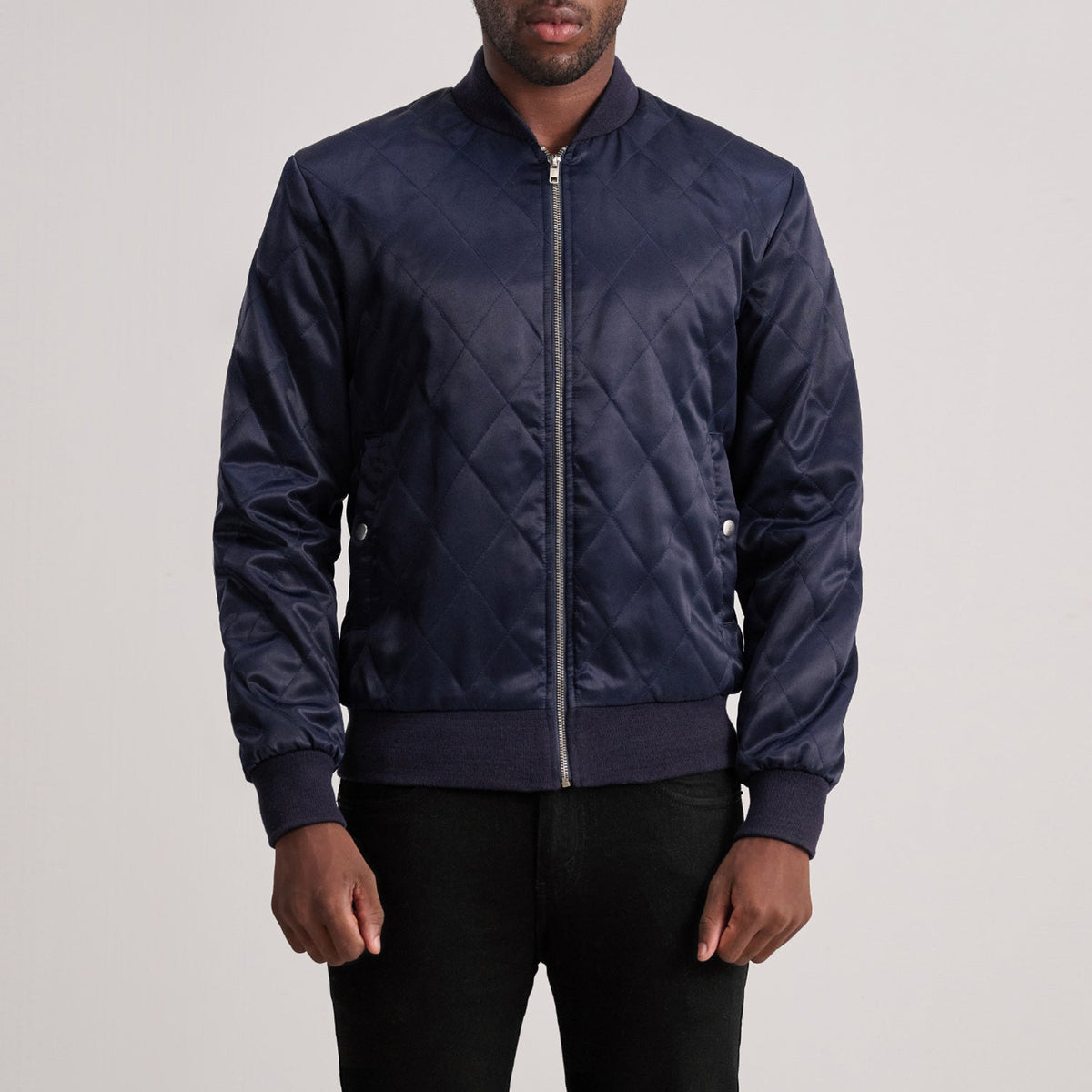 
Danson Quilted Blue Varsity Jacket in Blue Satin - Front Profile View & Tailored Silhouette | Buy Online