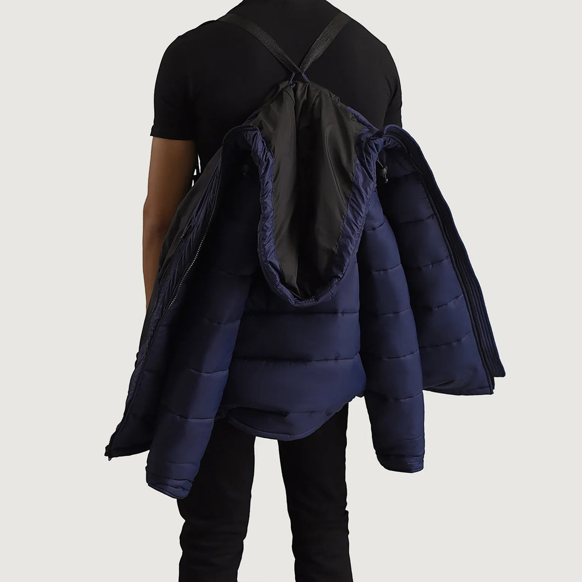 
Close-Up Detail of Classic Collar & Zipper With Wind Flap Hardware on Erico Blue Hooded Puffer Jacket