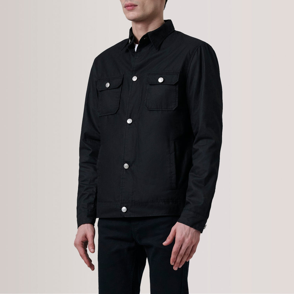 
Irwin Black Waxed Canvas Field Jacket For Men - Lateral Side Profile View Showing Sleeve Cut & Athletic Taper Fit