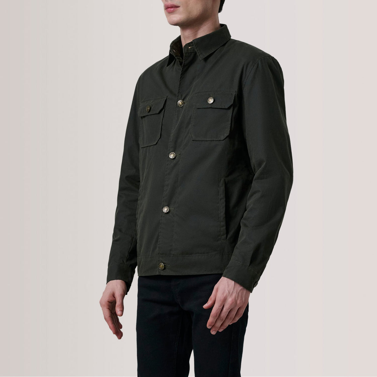 
Irwin Olive Waxed Canvas Field Jacket For Men - Lateral Side Profile View Showing Sleeve Cut & Athletic Taper Fit