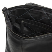 
Solid Antique Brass Hardware & Heavy-Duty Dual Zipper Detail on Manchester Full-Grain Leather Backpack