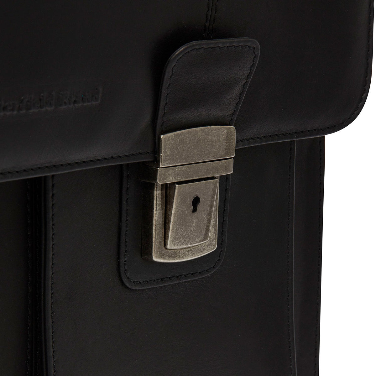 
100% Full-Grain Wax Pull-Up 100% Full-Grain Leather Grain Texture & Handcrafted Patina Detail