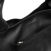 
Tenara Full-Grain Leather Handbag - Lateral Side Profile View Showing Sleeve Cut & Athletic Taper Fit