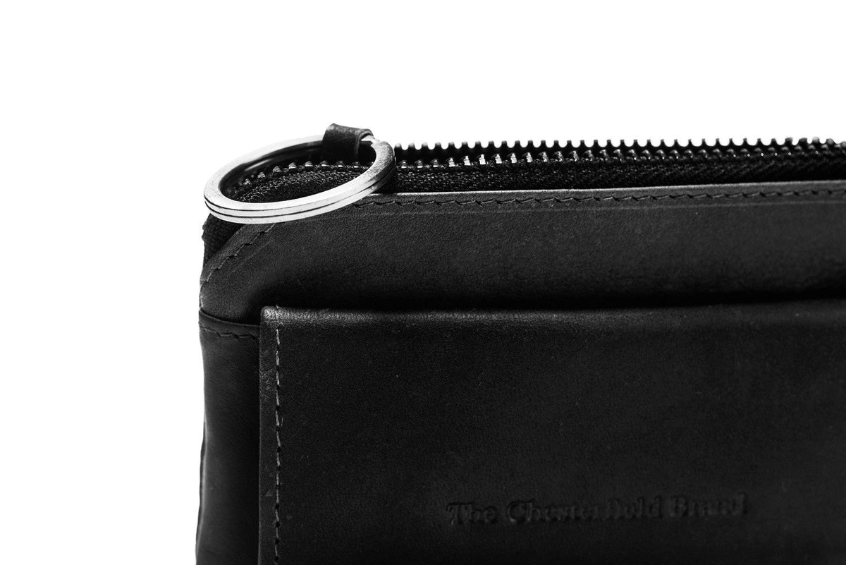 
Oliver Full-Grain Leather Key Case - Lateral Side Profile View Showing Sleeve Cut & Athletic Taper Fit