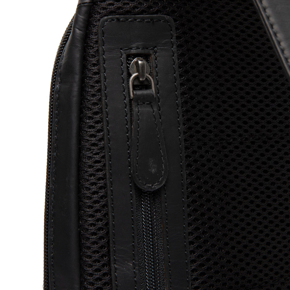 
Reinforced Leather Base with Protective Metal Studs Detail