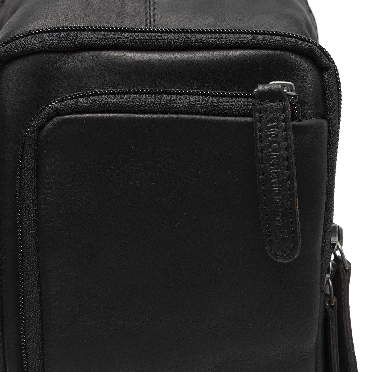 
Solid Antique Brass Hardware & Heavy-Duty Dual Zipper Detail on Leather Sling Bag Riga