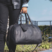 
Classic 100% Full-Grain Leather Duffle Bag - Rear Perspective Showing Reinforced Leather Straps & Stitching