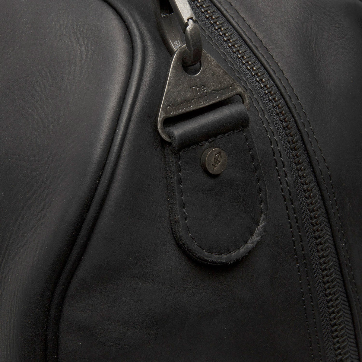 
Solid Antique Brass Hardware & Heavy-Duty Dual Zipper Detail on William Full-Grain Leather Weekender Bag