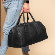
Classic 100% Full-Grain Leather Duffle Bag - Rear Perspective Showing Reinforced Leather Straps & Stitching