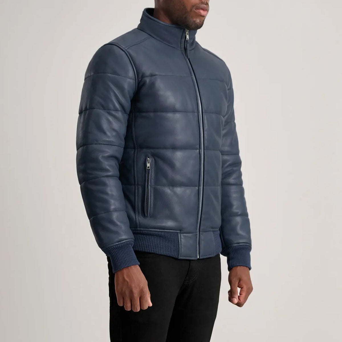 
Styled Fit Perspective of Lucas Blue Leather Puffer Bomber Jacket on Model - Natural Daylight Drape