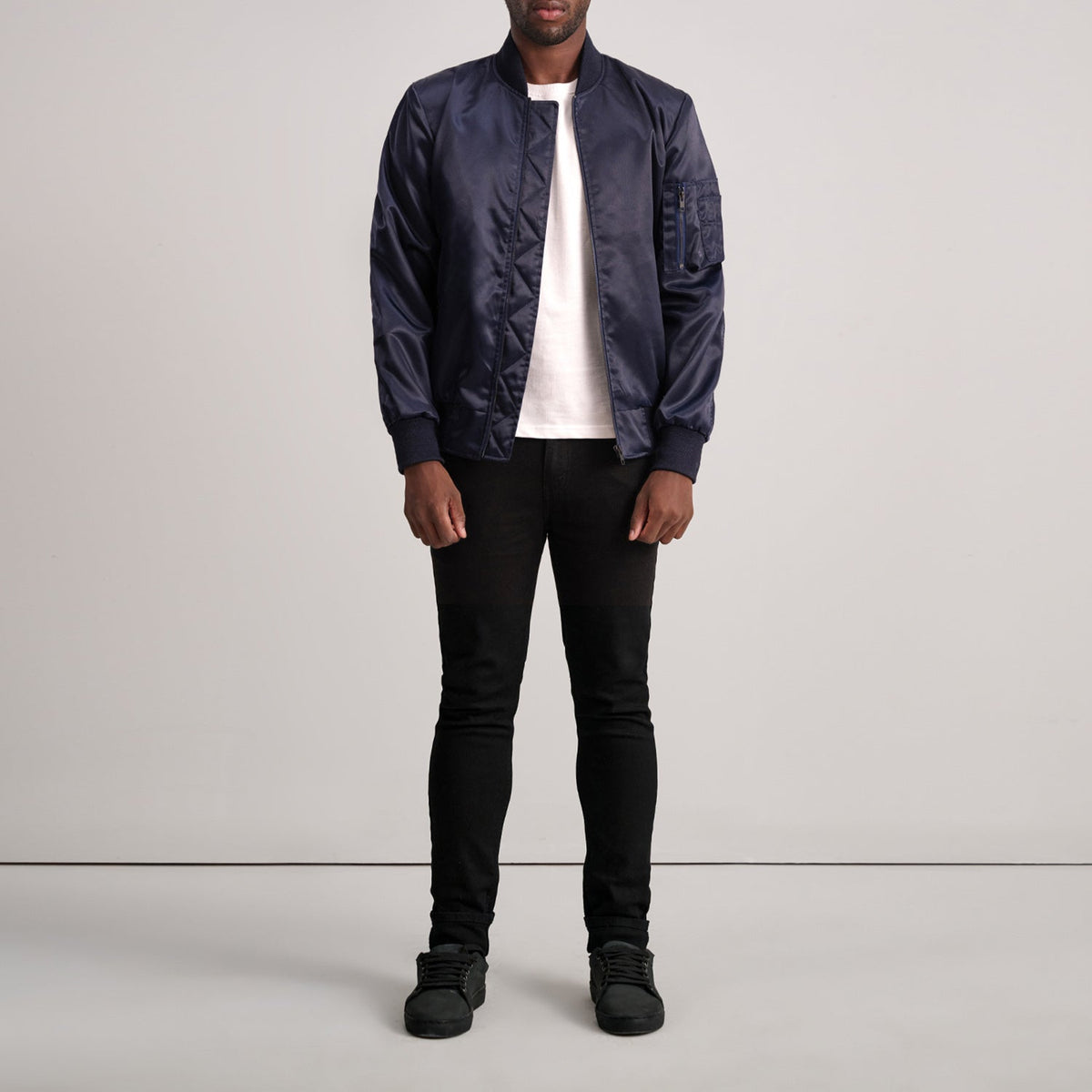 
Close-Up Detail of Varsity & Zipper Hardware on Quinton MA-1 Blue Bomber Jacket