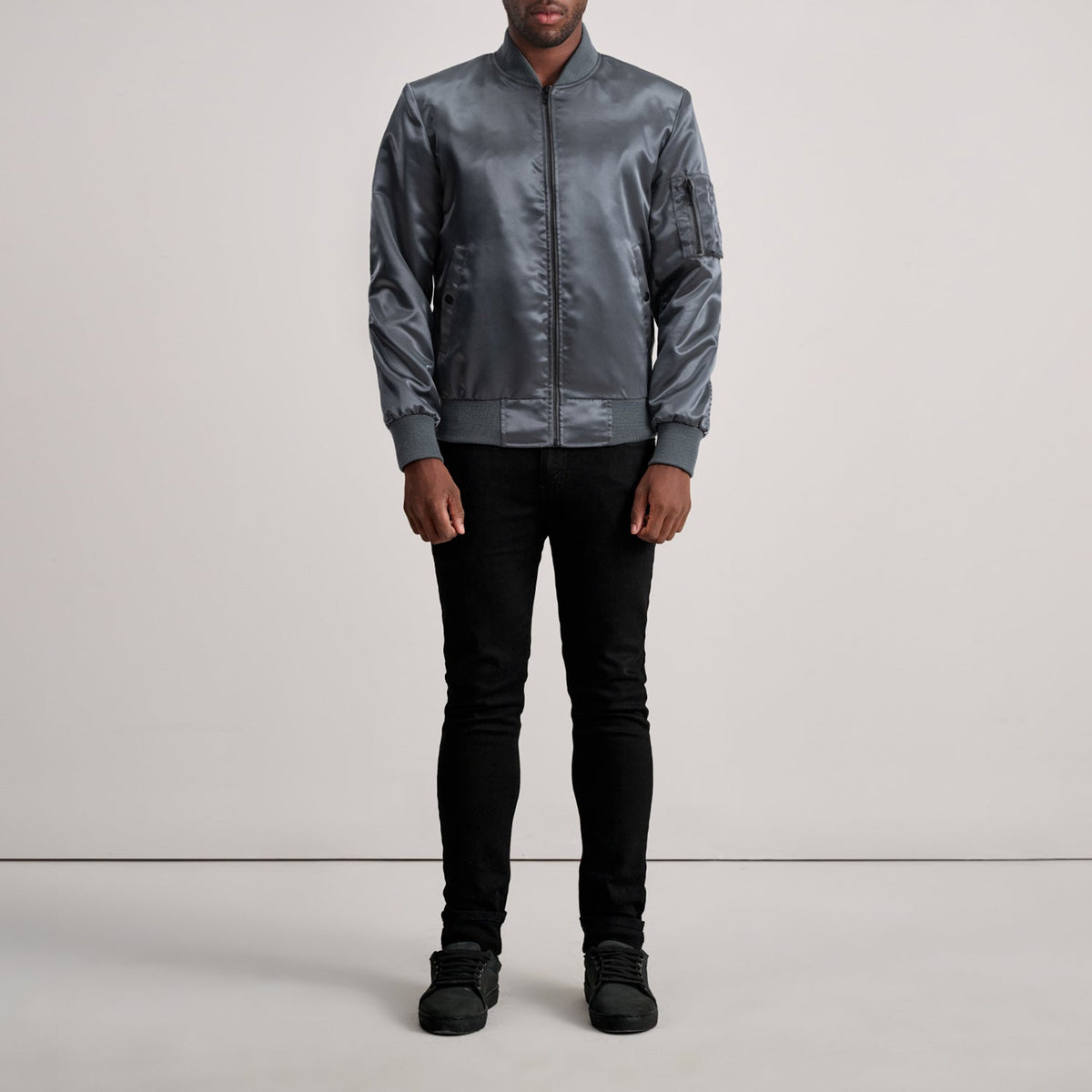 
Close-Up Detail of Varsity & Zipper Hardware on Quinton MA-1 Grey Bomber Jacket