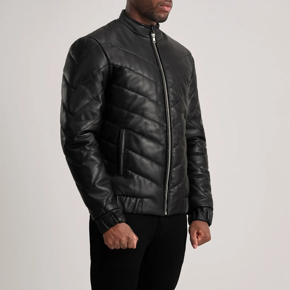 
Black Sheepskin Leather Puffer Jacket - Back View Showing Tailored Shoulder Fit & Clean Hemline