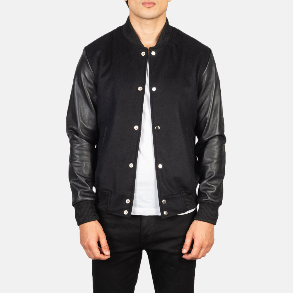 
Men's Vaxton Black Hybrid Varsity Jacket in Black Sheepskin Leather - Front Profile View & Tailored Silhouette | Buy Online