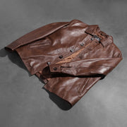
Buttoned & Hem Craftsmanship Construction Detail on Waffle Brown Leather Jacket